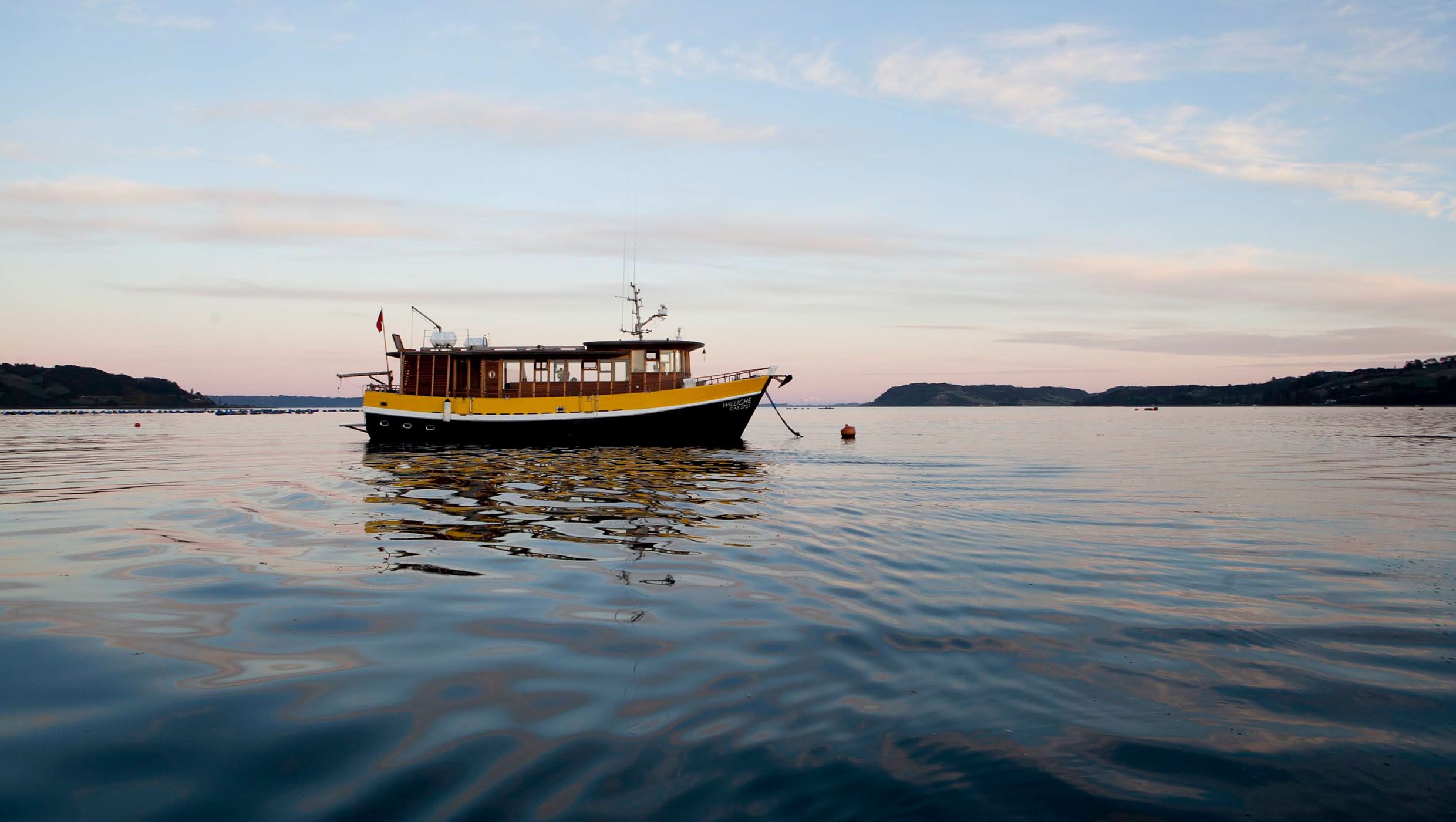 Sailing on the Wilichie - part of the luxury experiential travel at Refugia Chiloé